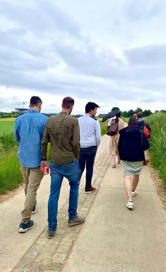 Harmony team walking to increase wellness, walking through fields